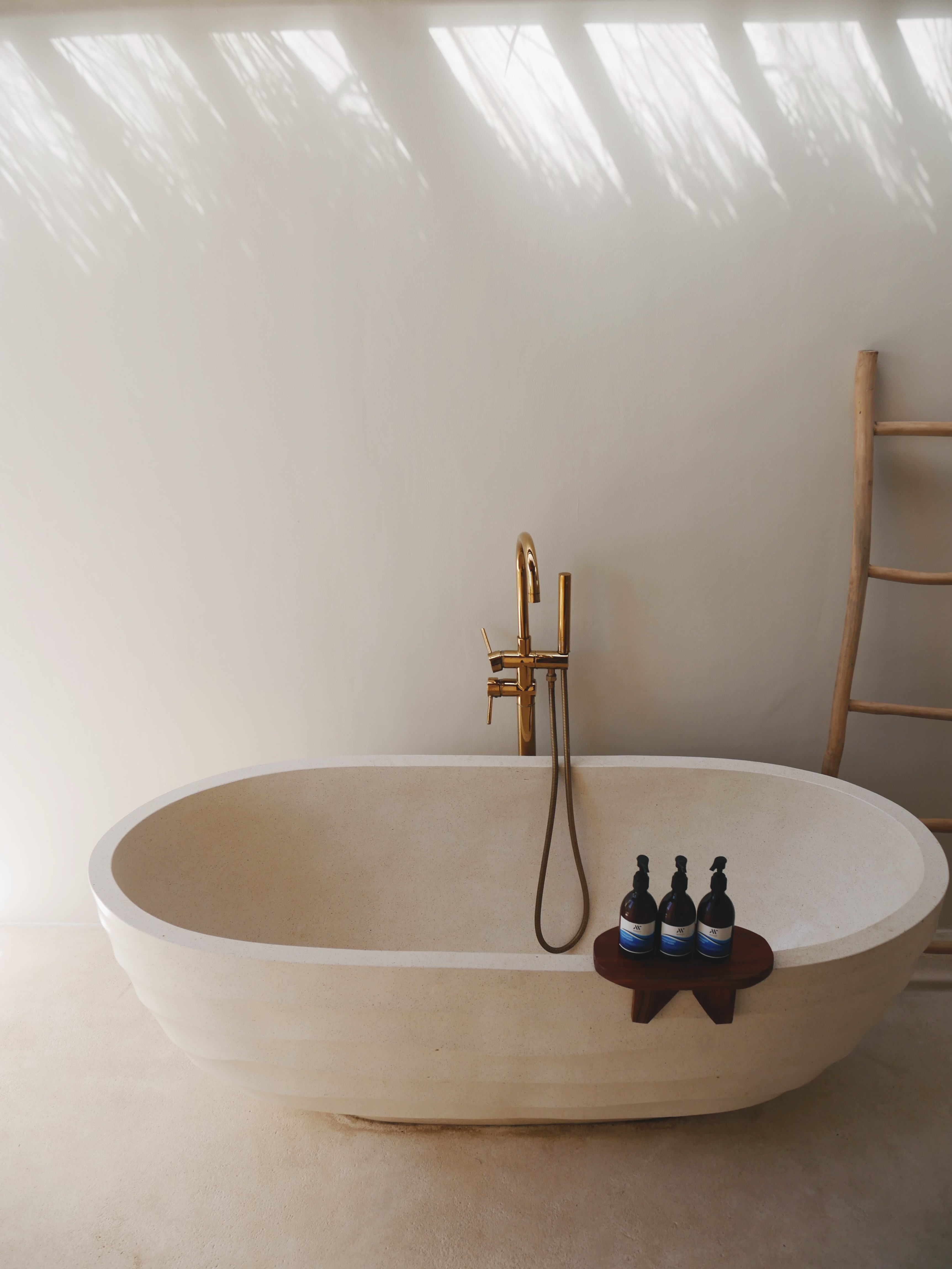 Manggis Villas — freestanding bath with morning light